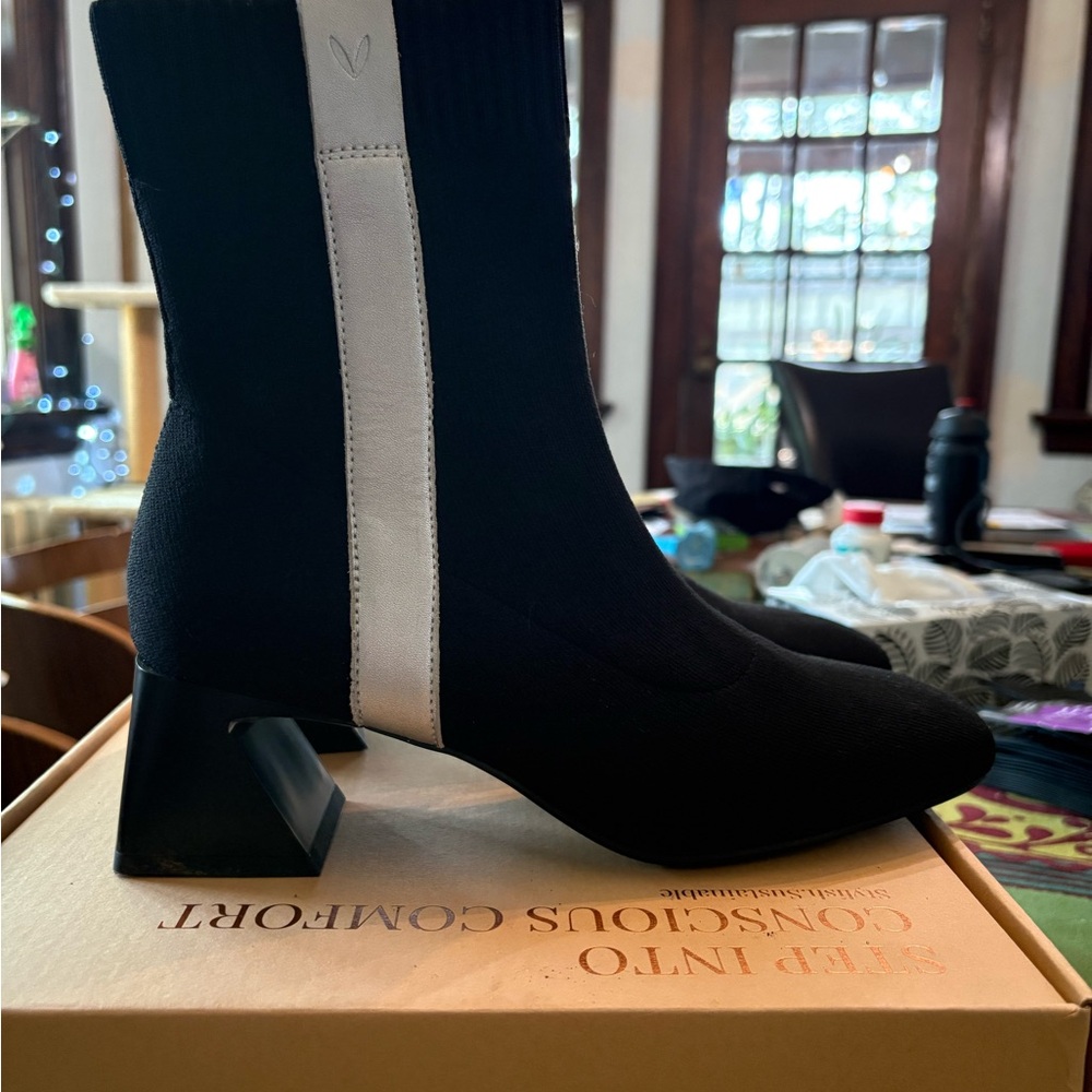 Stylish Black and White Heeled Boots